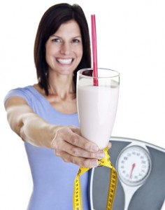 lady holding meal replacement shake